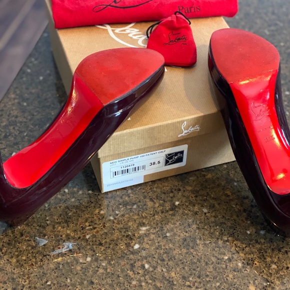 Wine colored Christian Louboutin gently used simple pump